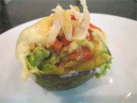 receta de Aguacate relleno cubierto de queso