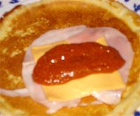 receta de San Jacobos de crepes rellenos de salsa boloñesa